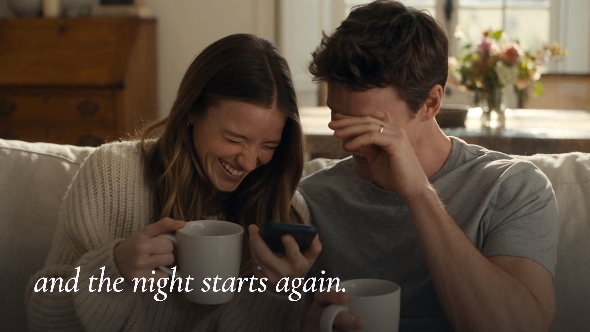 The day after the wedding, the couple burst out laughing on their couch as they listen to their guests’ messages