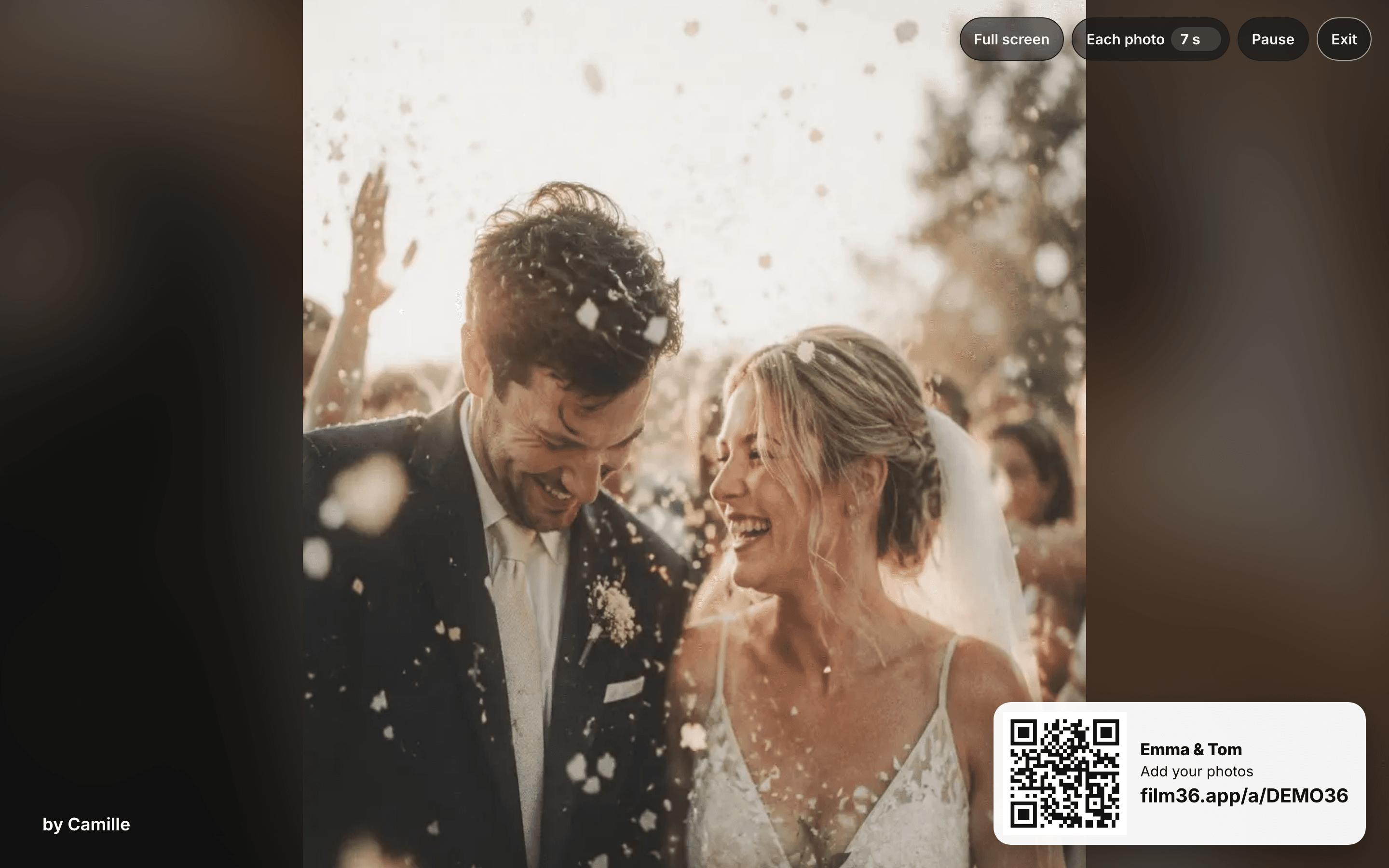 The live slideshow: one photo full screen, with the Full screen, Each photo, Pause and Exit controls